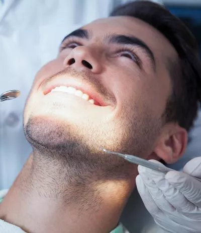 man undergoing a smile makeover at Smile Design Center